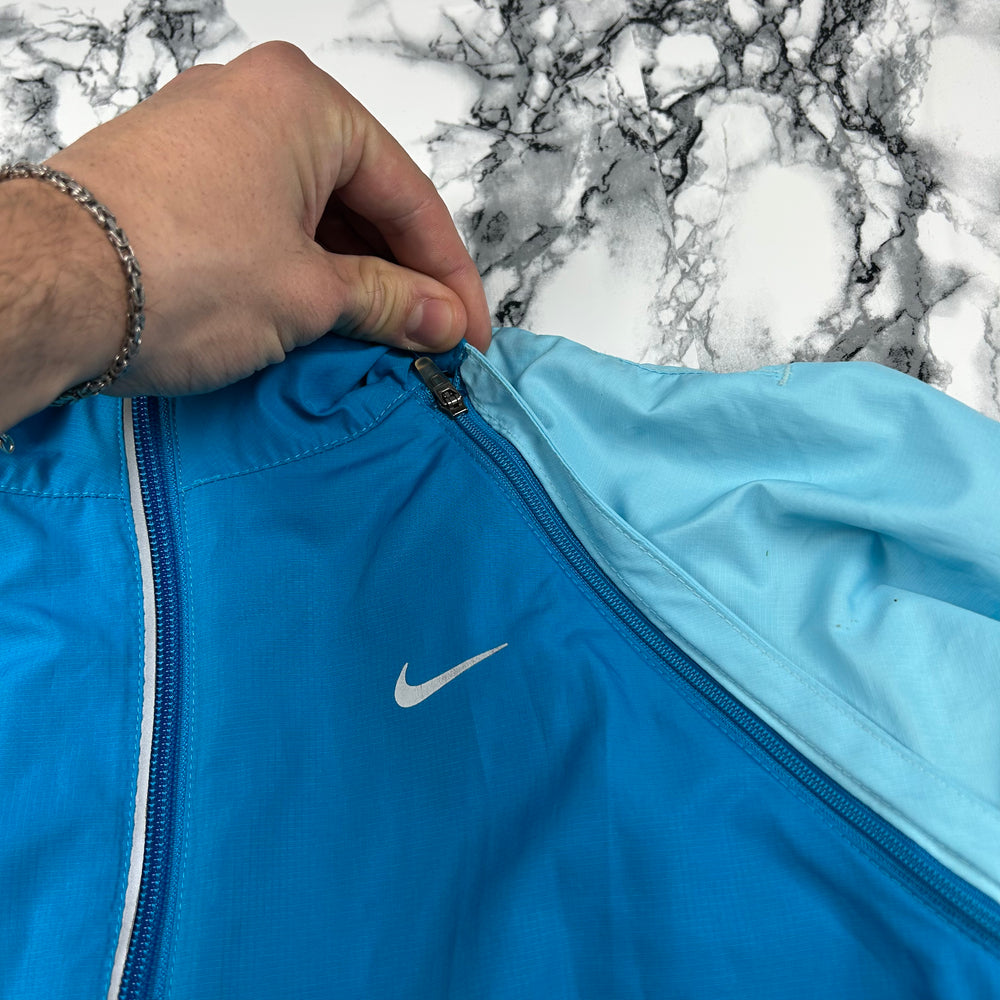 (S) Vintage Nike Damen Stormfit Windbreaker Hellblau